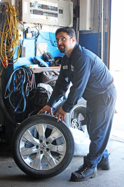 Paul Gierriero from Sam's Service Centre with a tire